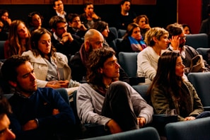 An audience captivated during a lecture on philosophy.