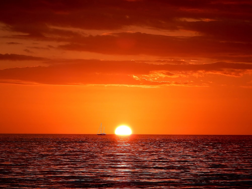 calm body of water during golden hour