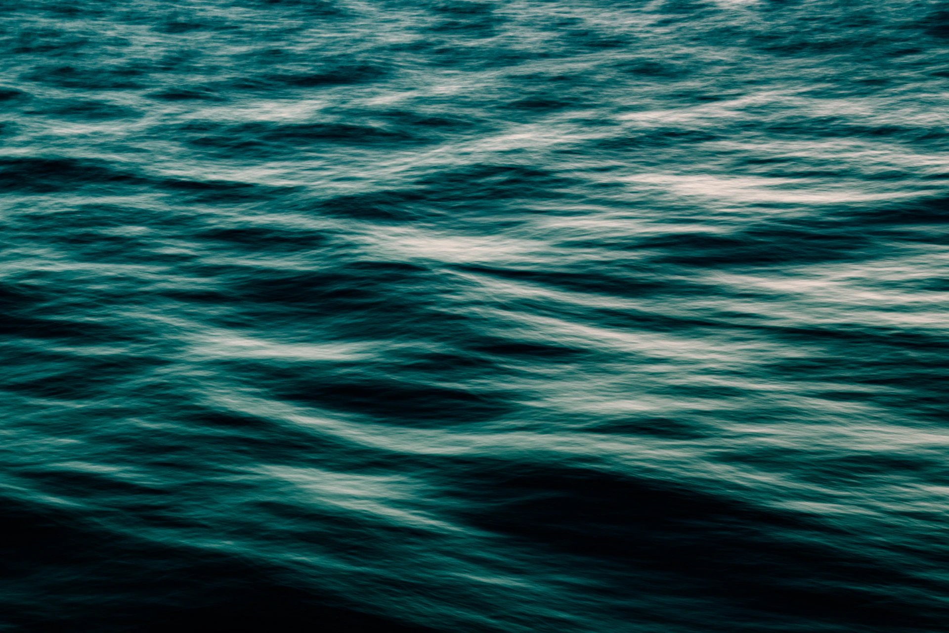 calm body of sea during daytime