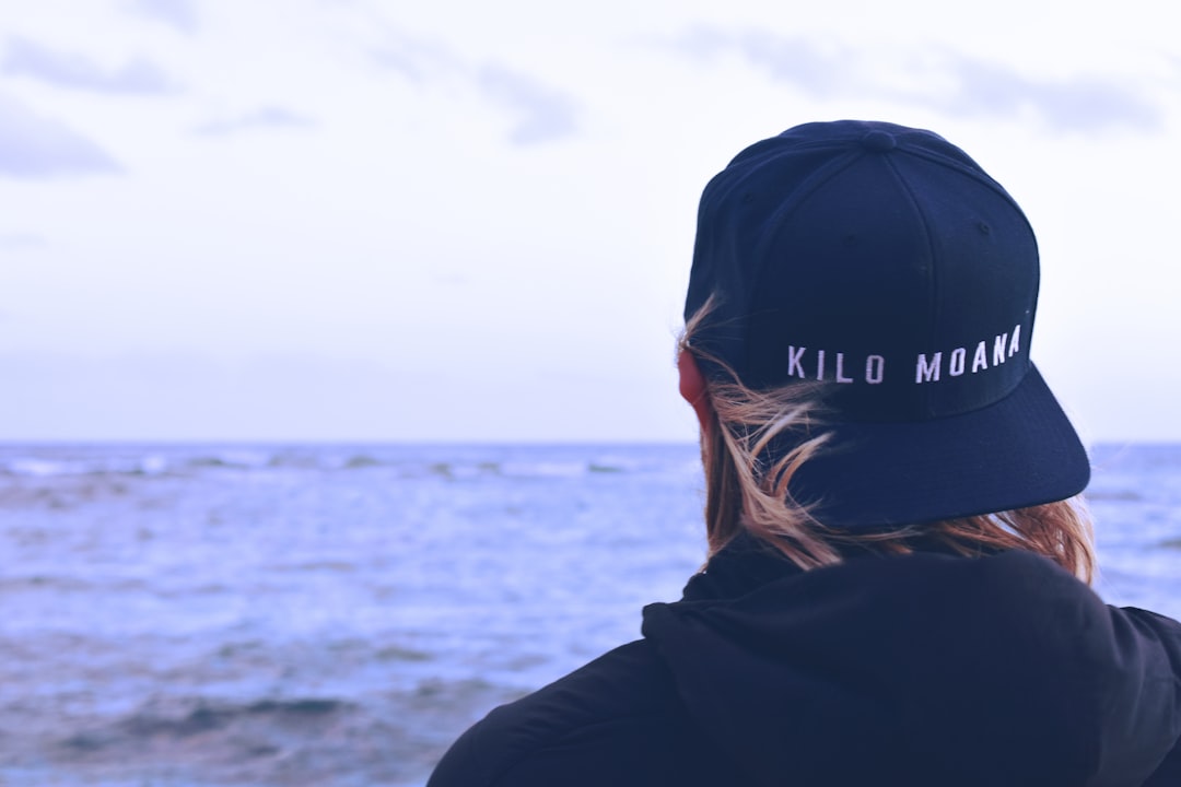 person standing near body of water