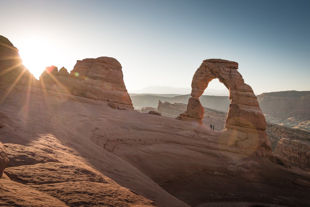 two people under stone formation