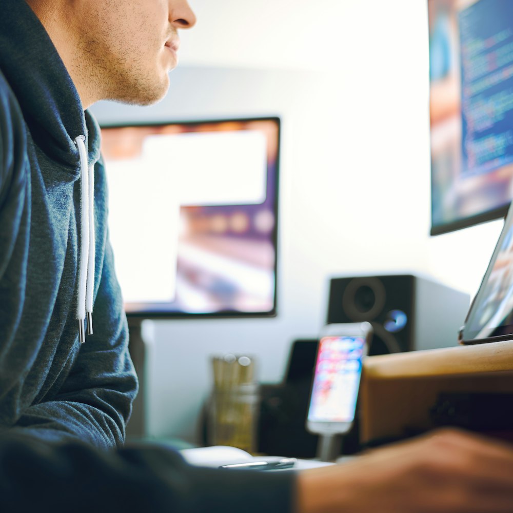 person sitting infront on device