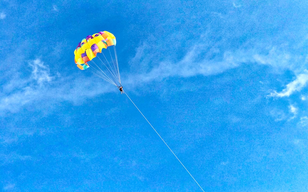 person paragliding outdoors