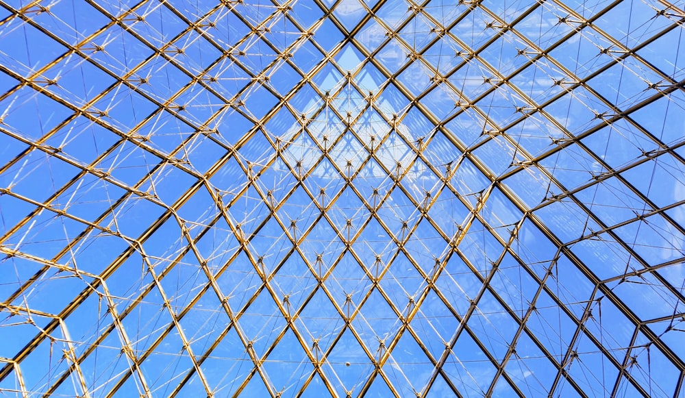 high angle photo of clear and brown glass infrastructure during daytime