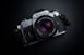 black and gray Nikon camera