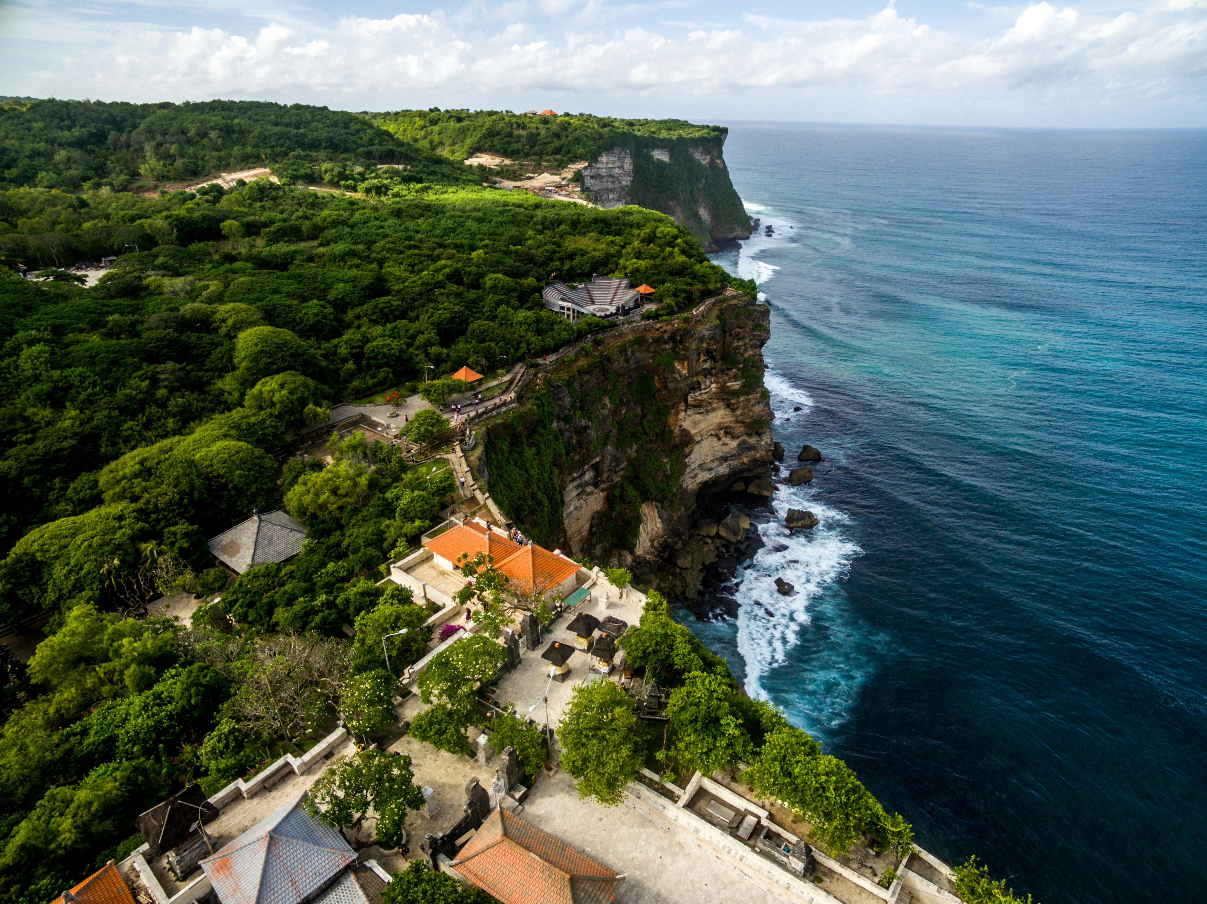 aerial photo of sea wave crashing shoreline photo Free 
