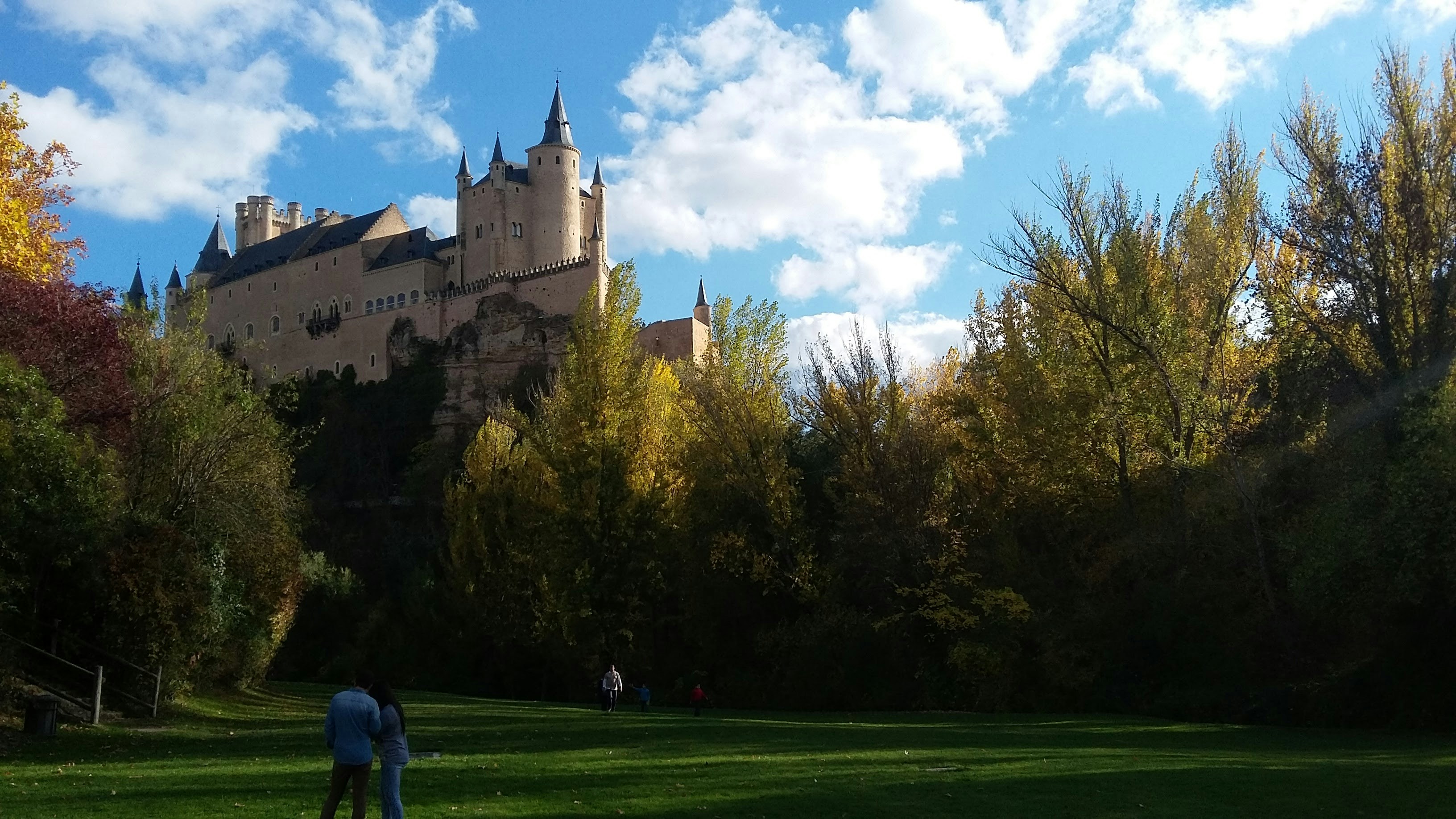 Couple looking at brown castle