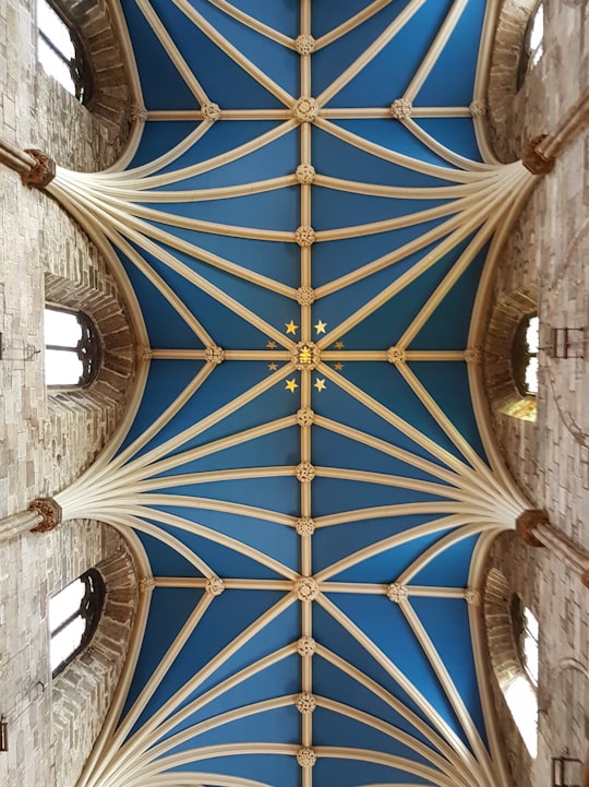 closeup photo of brown and blue ceiling in St Giles' Cathedral United Kingdom