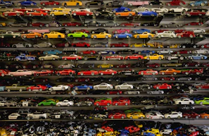 die-cast car collection on rack