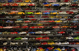 die-cast car collection on rack