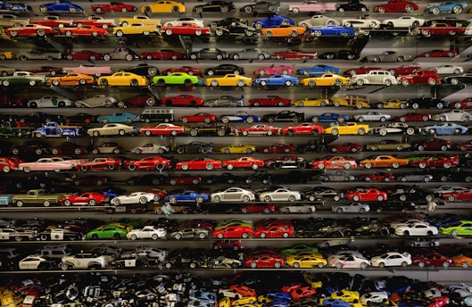 die-cast car collection on rack