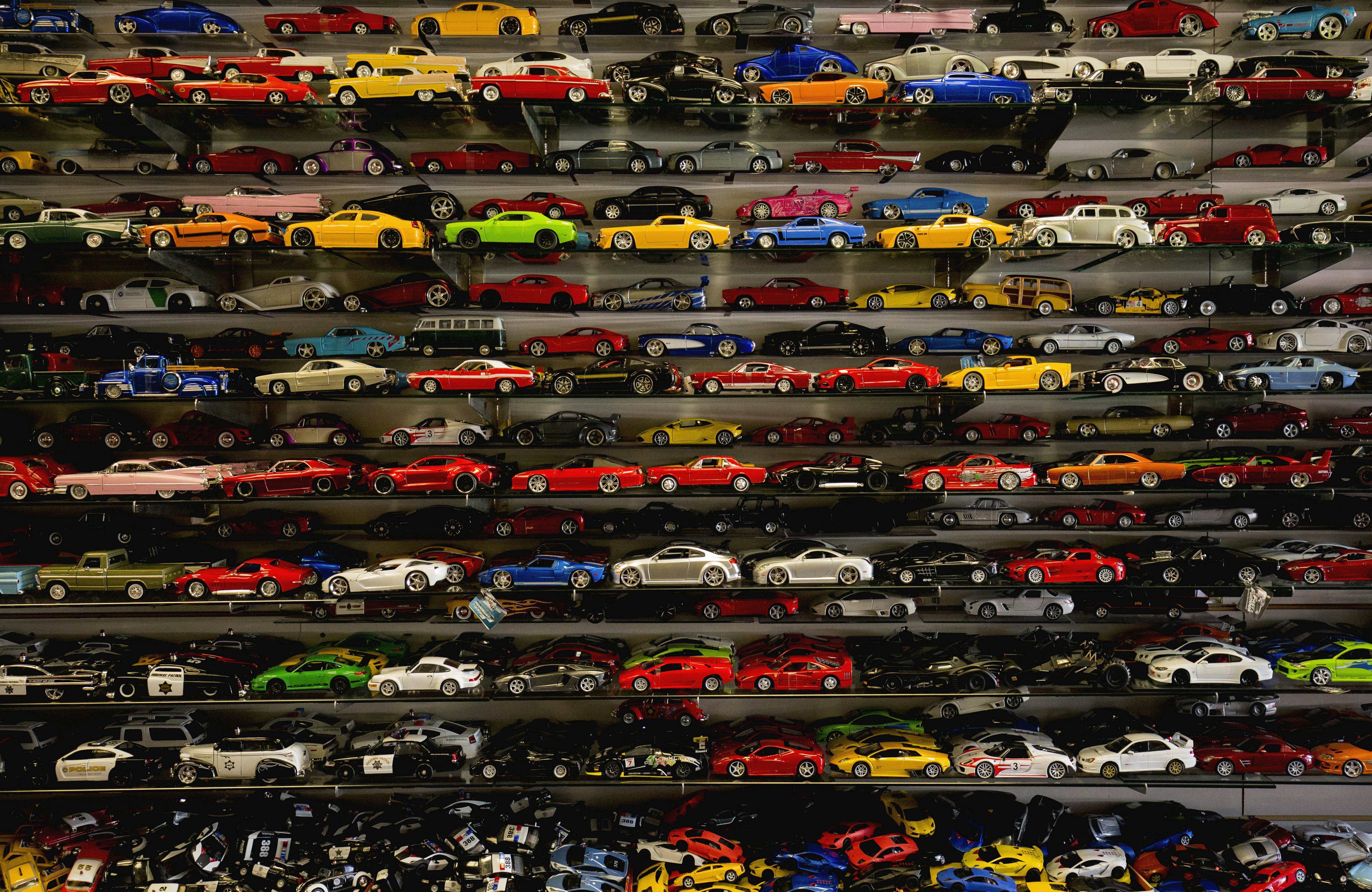 die-cast car collection on rack
