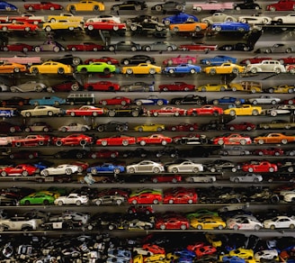 die-cast car collection on rack