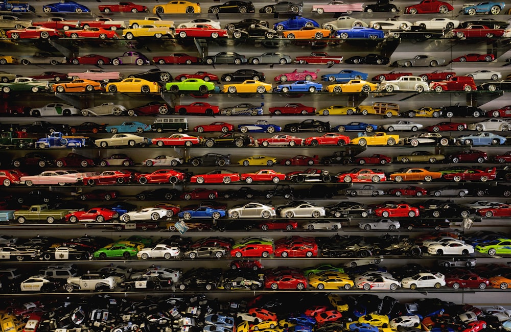 die-cast car collection on rack