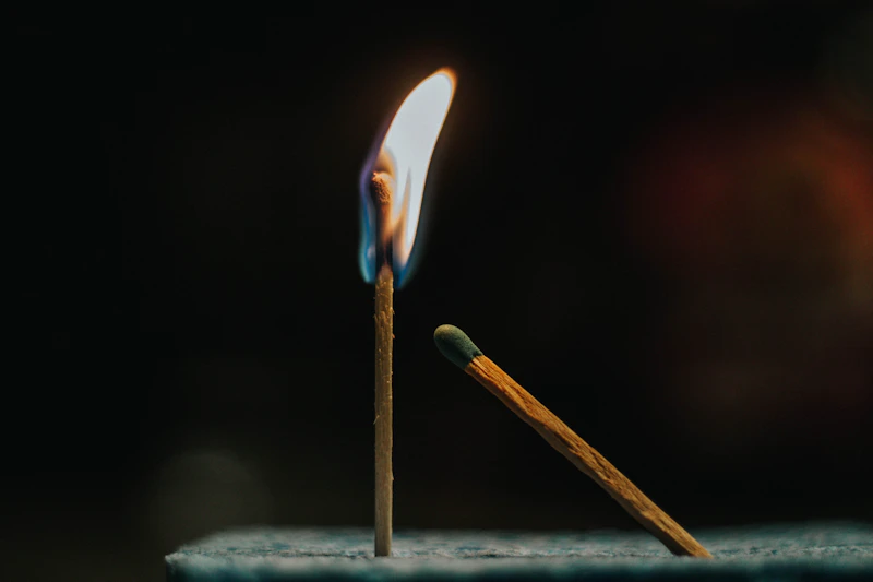 Close-up of a lit matchstick