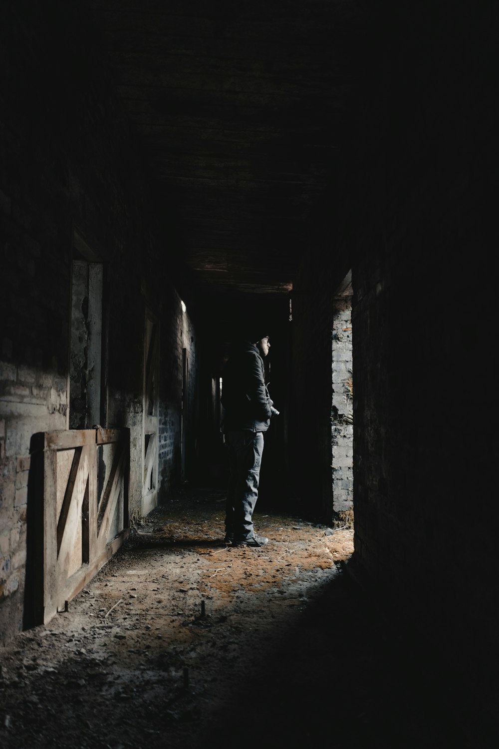 man standing on hallway