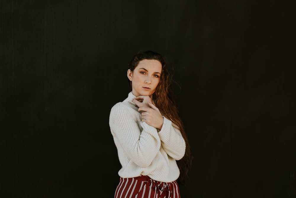 woman in white sweater