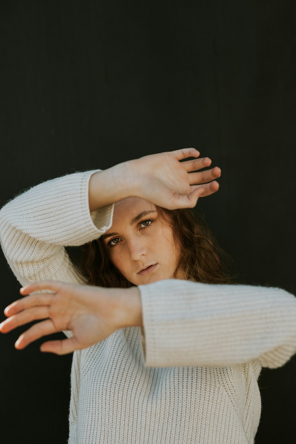 woman wearing white corduroy long-sleeved shirt