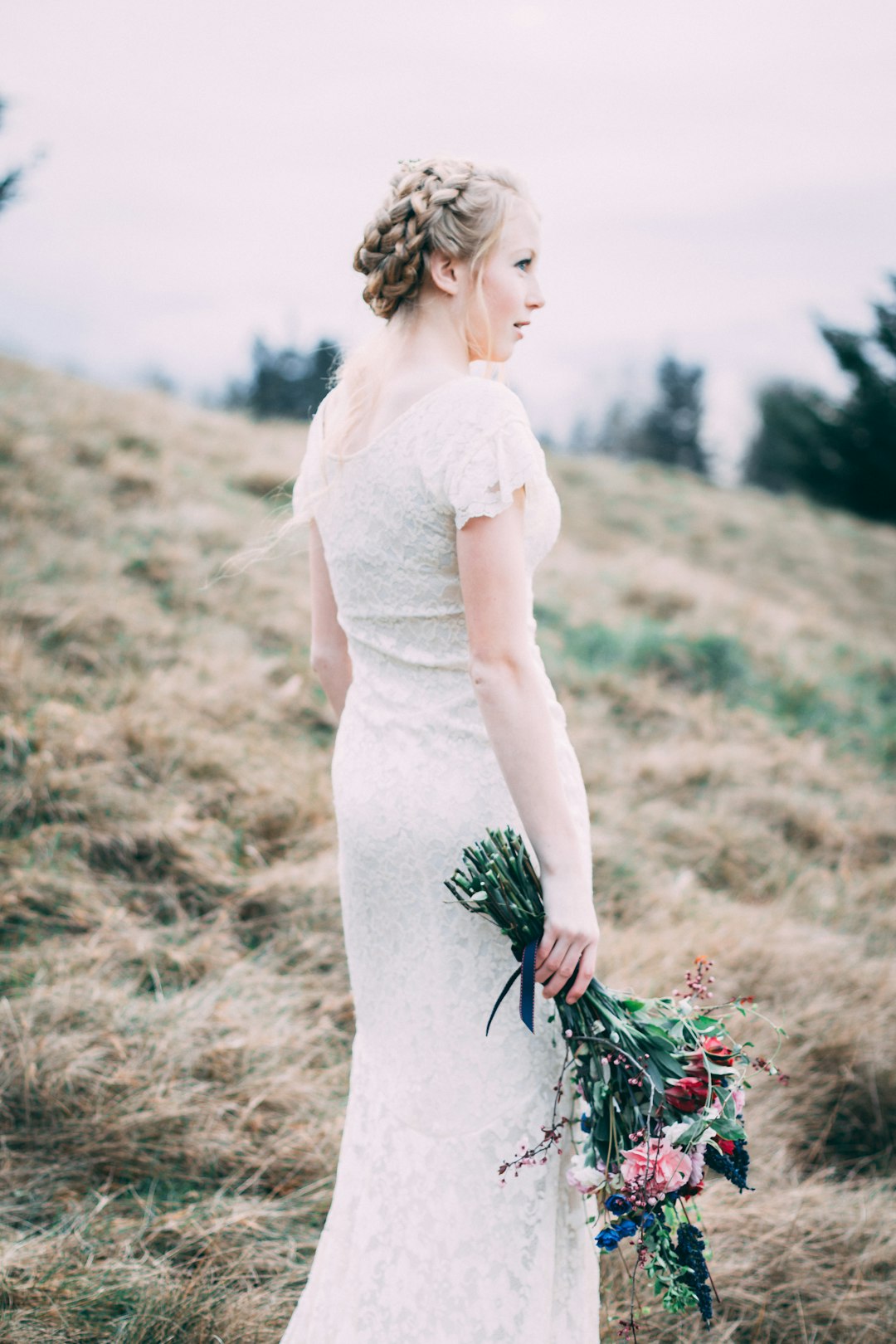 woman holding flower bouquet