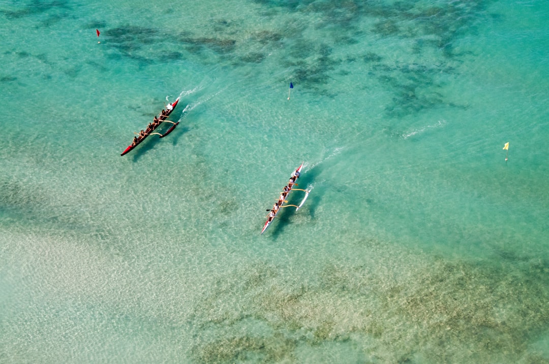 bird's eye view of two boats on body of water