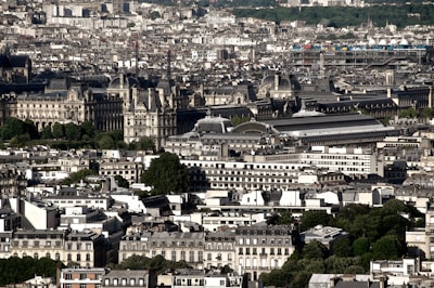 A bustling cityscape showcasing iconic landmarks and vibrant street life.