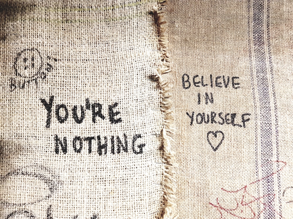 you're nothing and believe in yourself printed sacks