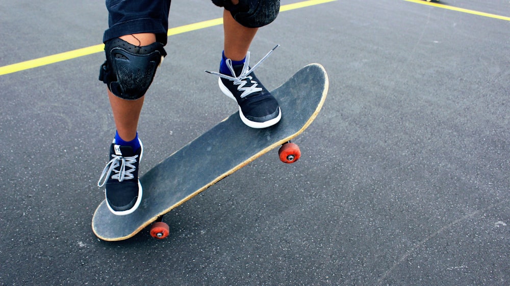 person on skateboard at daytime