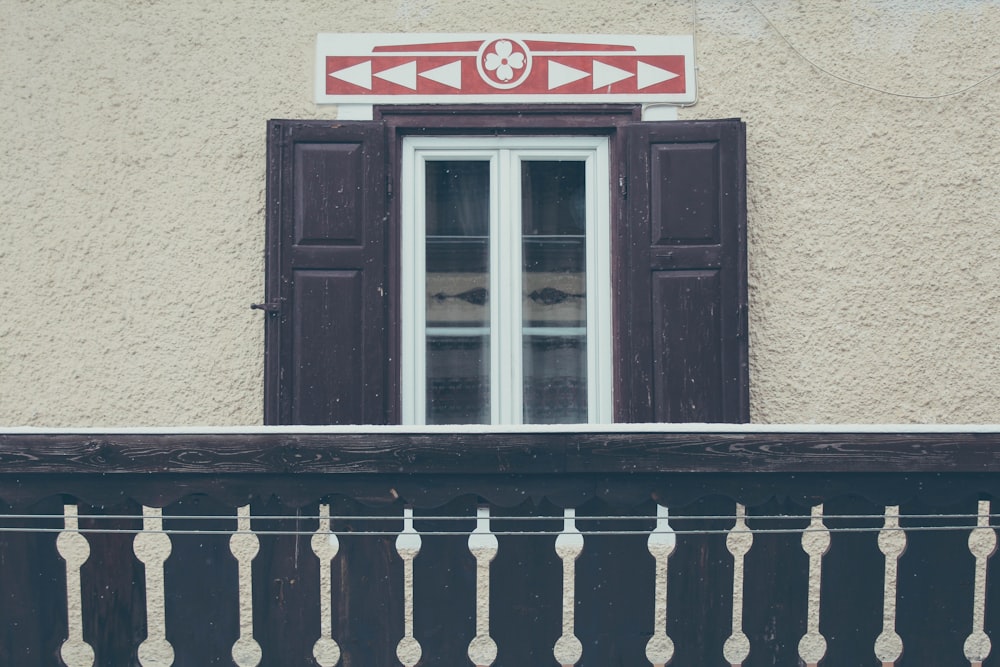 opened brown wooden door at daytime