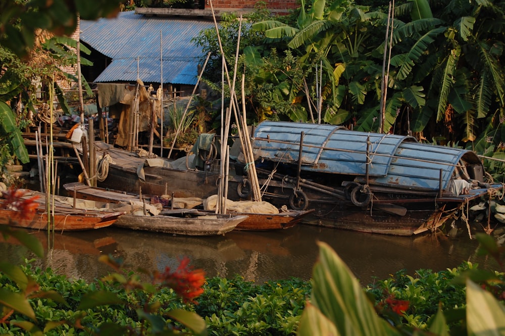 wooden boat on body of water during daytime