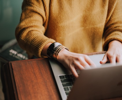 person using laptop computer