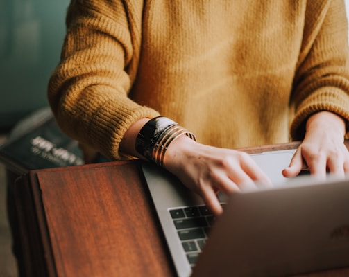 person using laptop computer