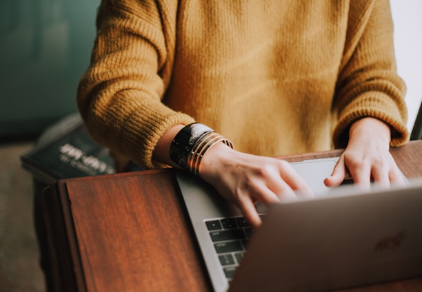 person using laptop computer