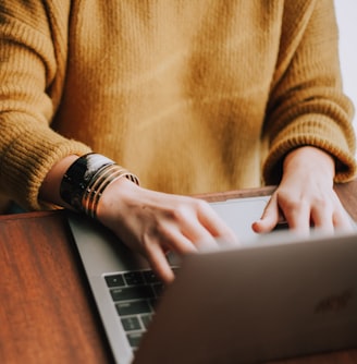 person using laptop computer