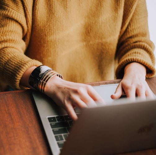 person using laptop computer