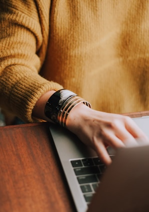 person using laptop computer