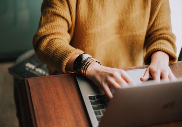 person using laptop computer