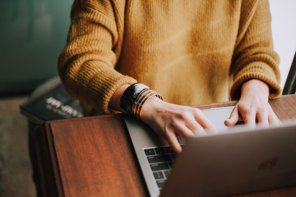 person using laptop computer