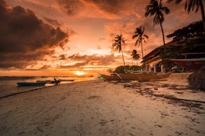 photography of beach resort during golden hour