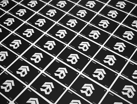 a group of white arrows on a black background