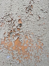cracked gray wall paint