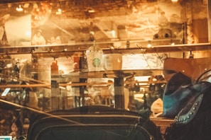 A cozy café setting with travelers enjoying their drinks.