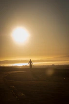 A serene scene of a person jogging at sunrise, symbolizing longevity and vitality.