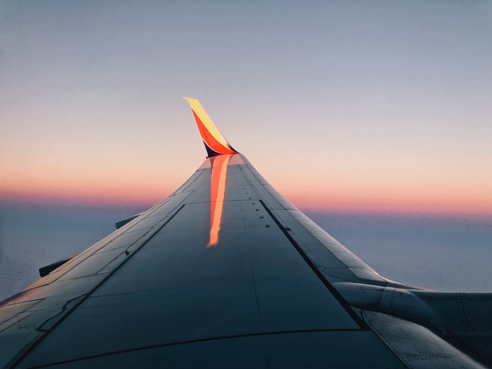 photo of gray airplane wing