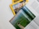 A collection of magazines with a focus on National Geographic, featuring an explorer theme. An open magazine displays an image of a person by the water, possibly involved in a fishing or marine activity, with text on the right side.