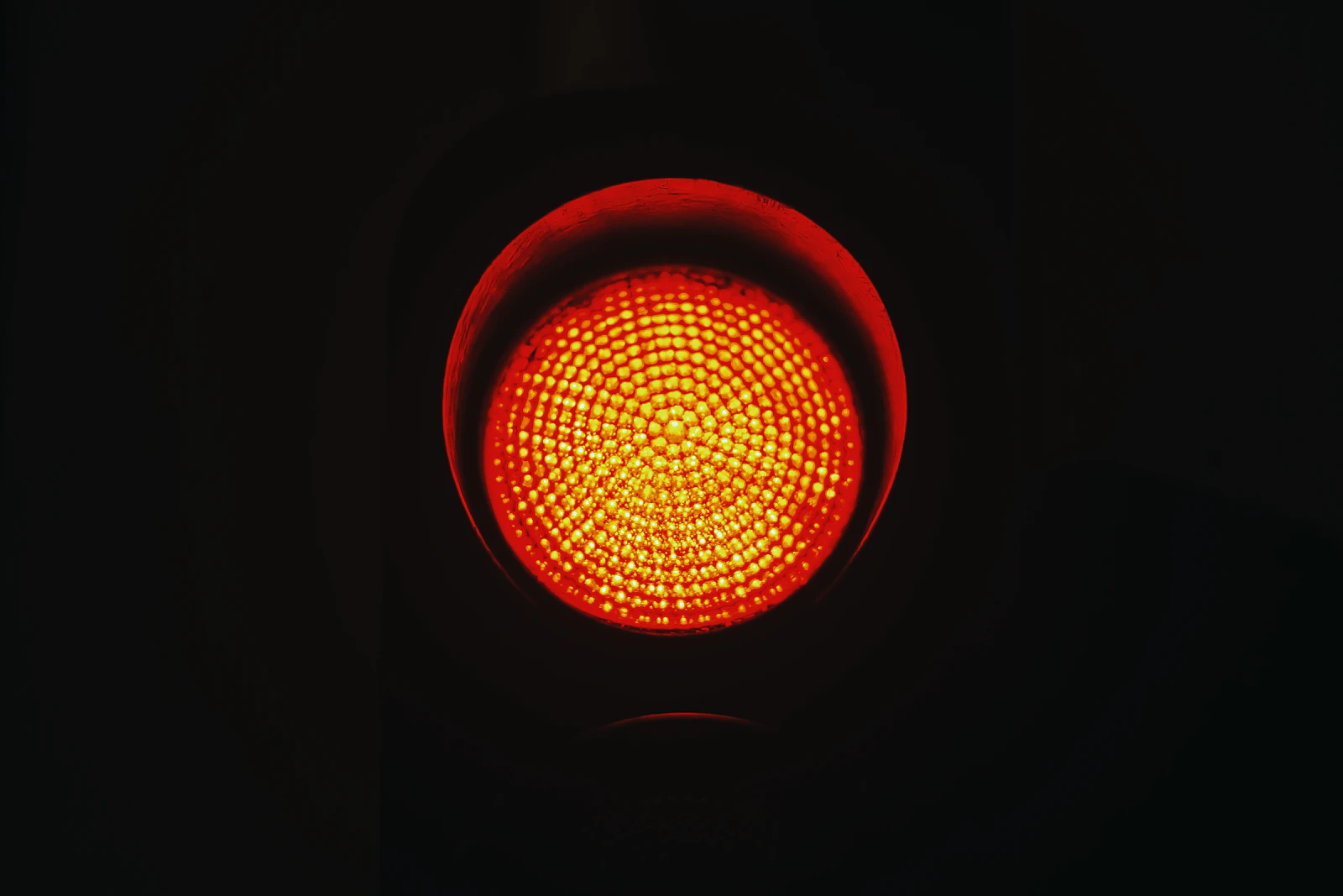 Soft red light glowing in a calm, dim room
