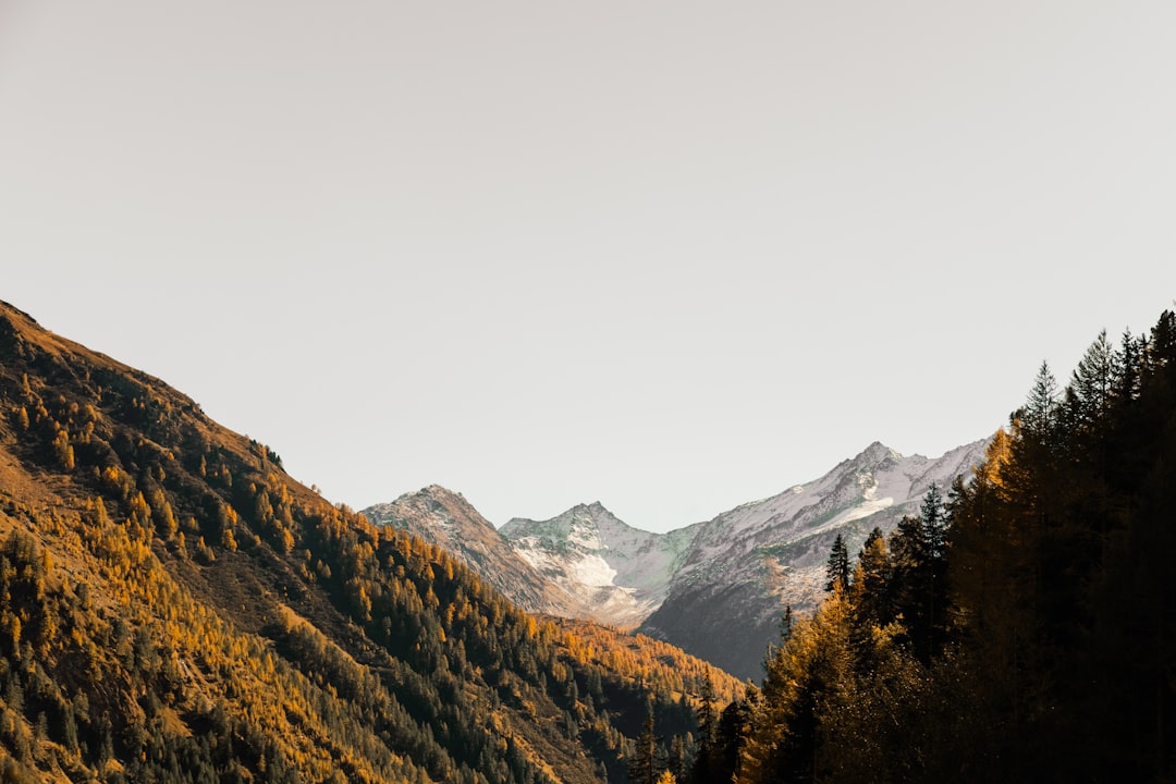 aerial photography of mountain under cloudy sky