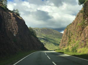A winding mountain road crossing the High Atlas with a view of the Tizi n’Tichka pass.