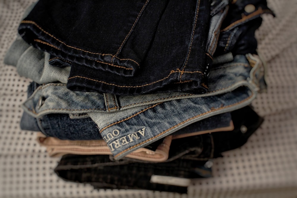 photo of folded denim bottoms