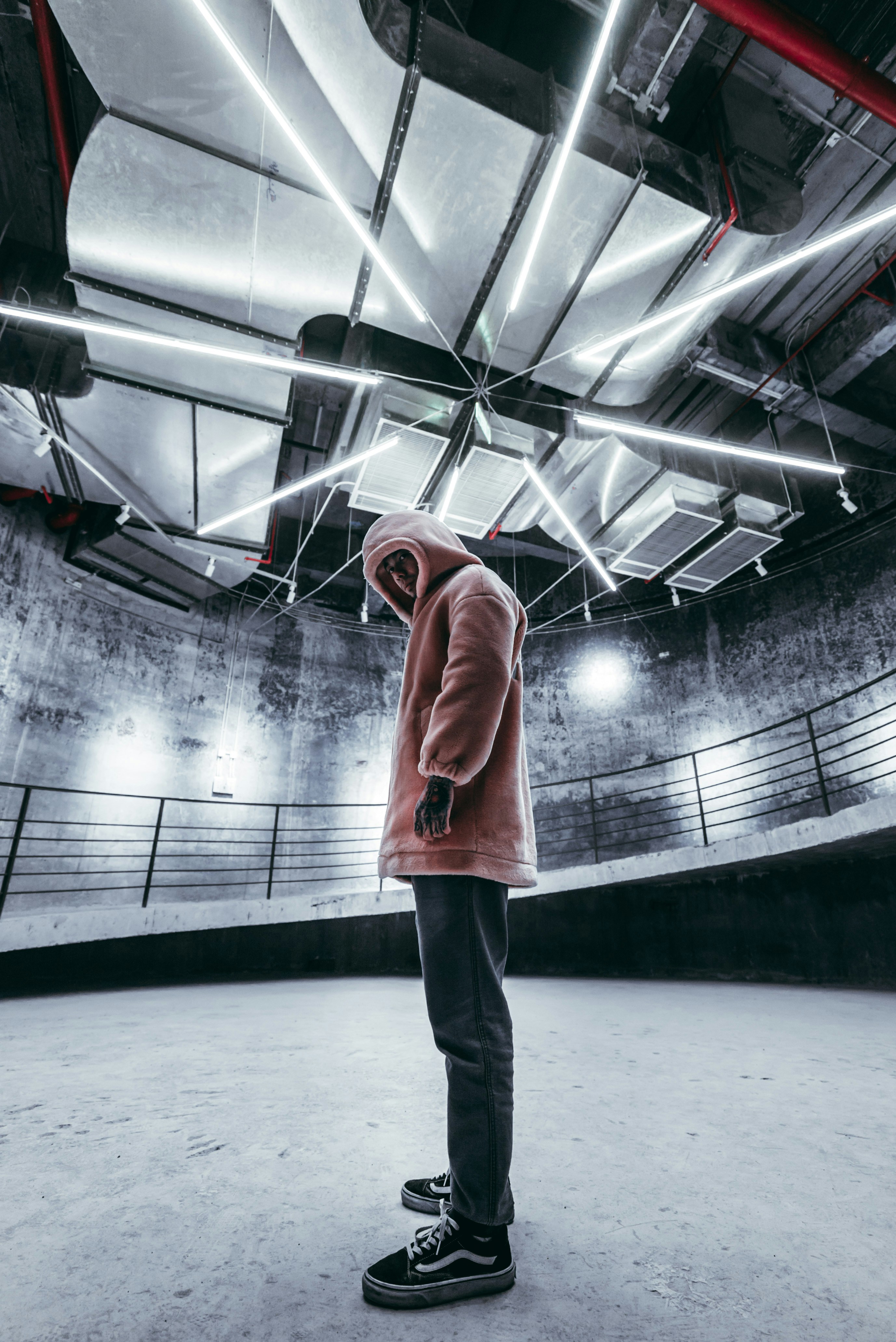 woman wearing yellow long-sleeved dress under white clouds and blue sky during daytime