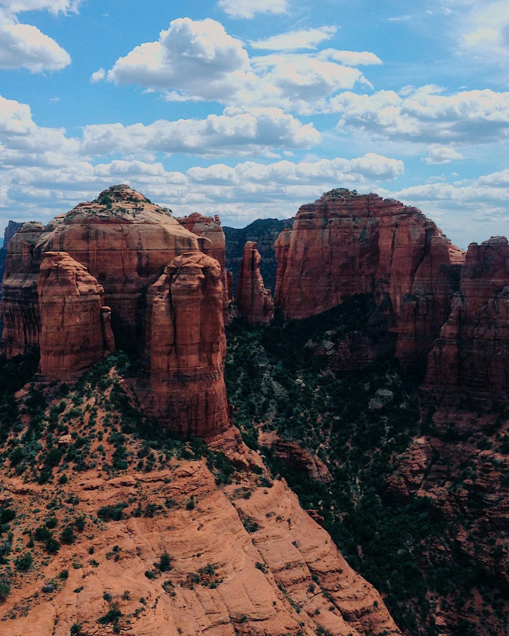 rock formation under cloudy sky